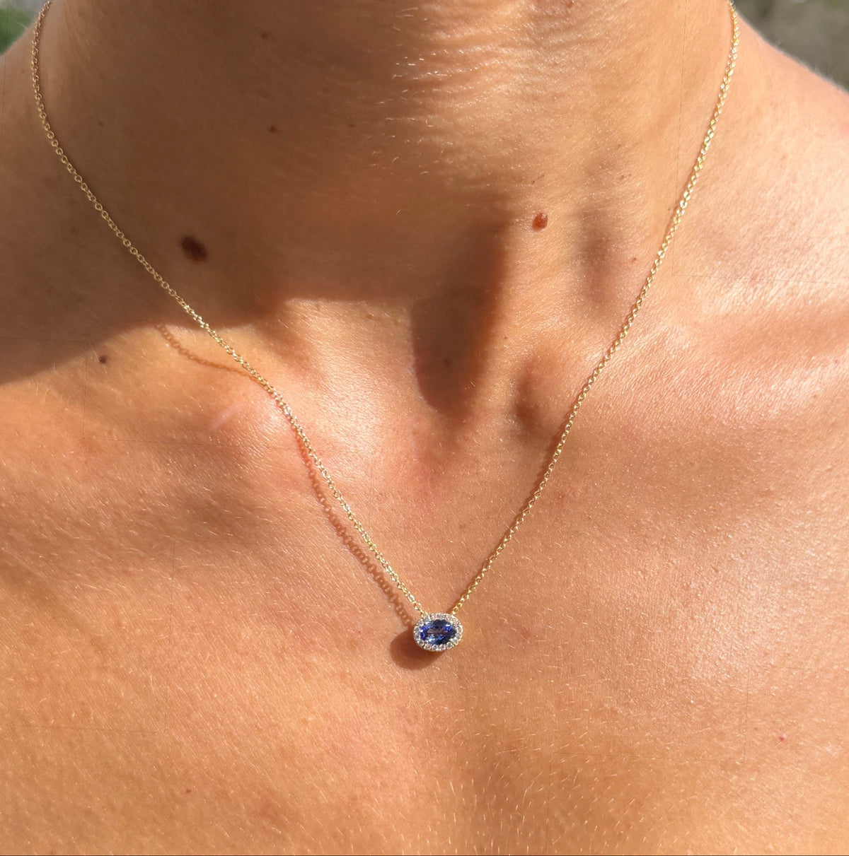 Tanzanite and Diamond Halo Pendant Necklace