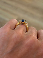 Sapphire Ring with Emerald Cut Diamond Accents