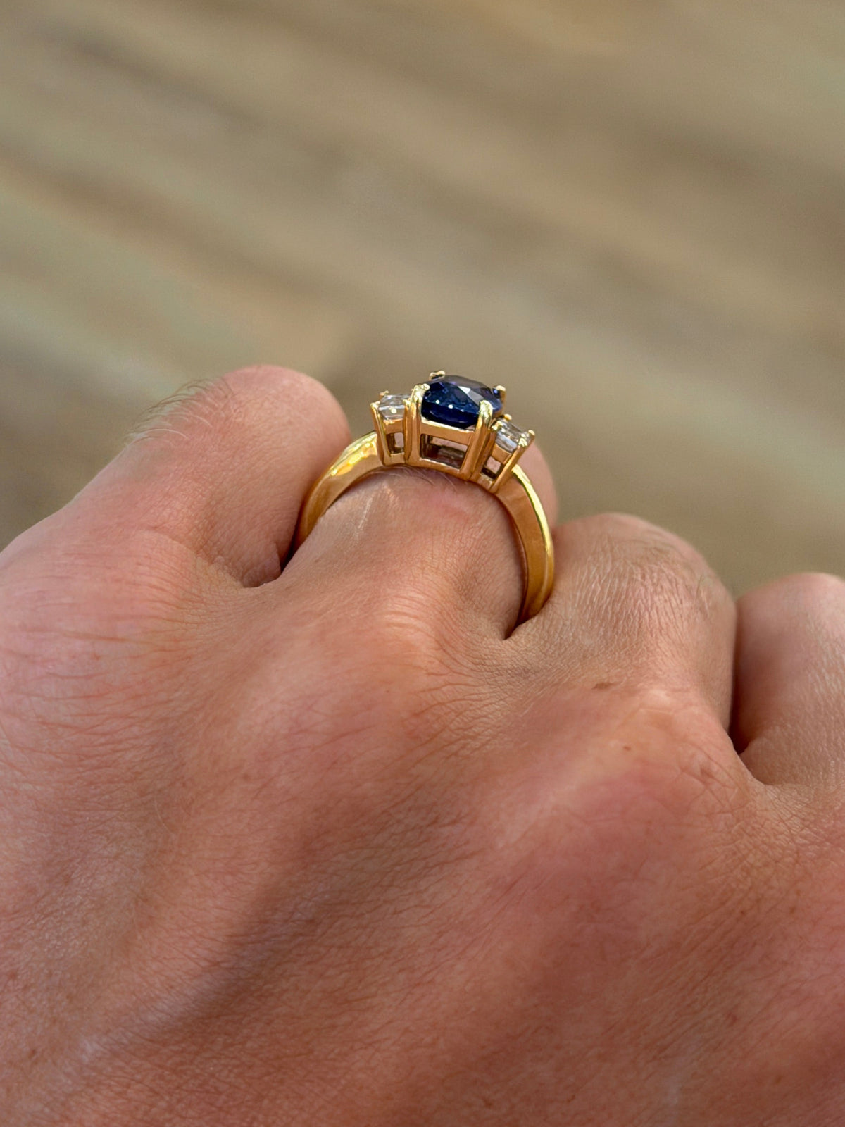 Sapphire Ring with Emerald Cut Diamond Accents