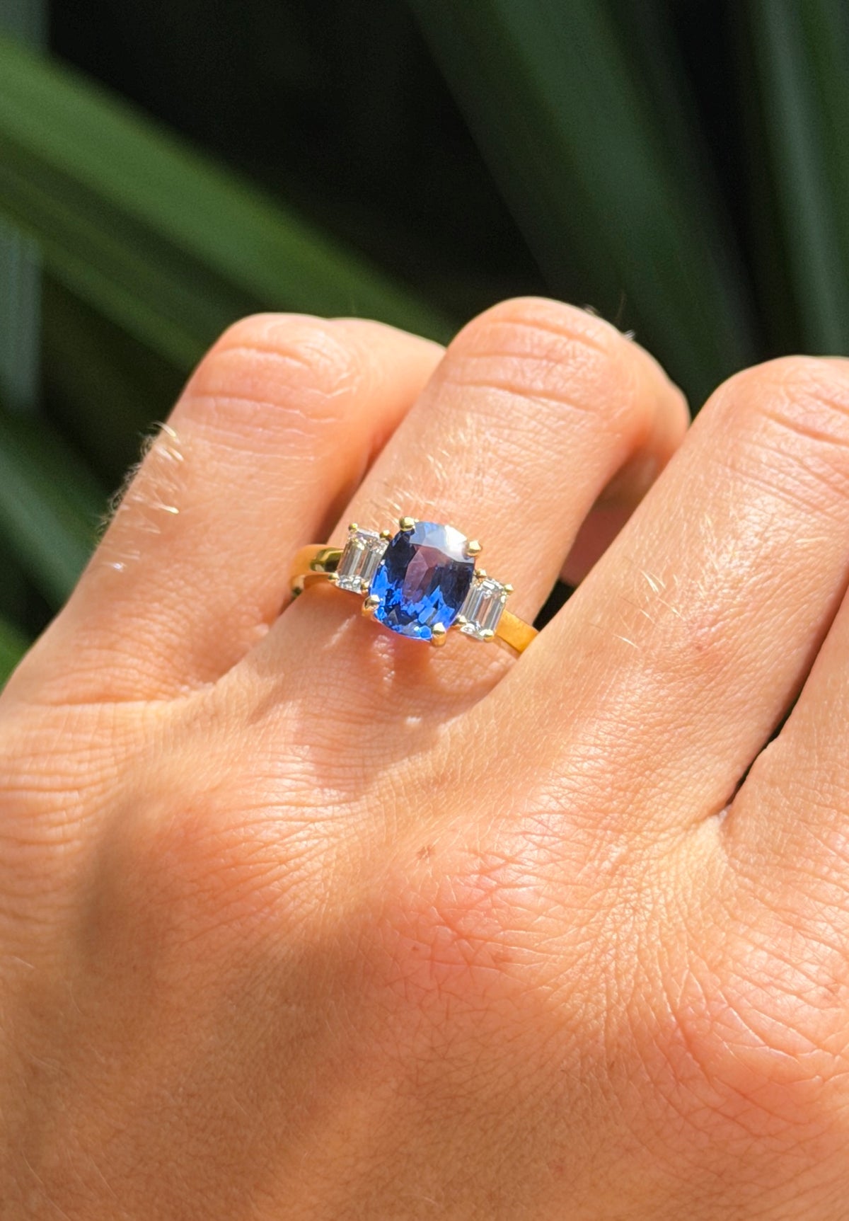 Sapphire Ring with Emerald Cut Diamond Accents