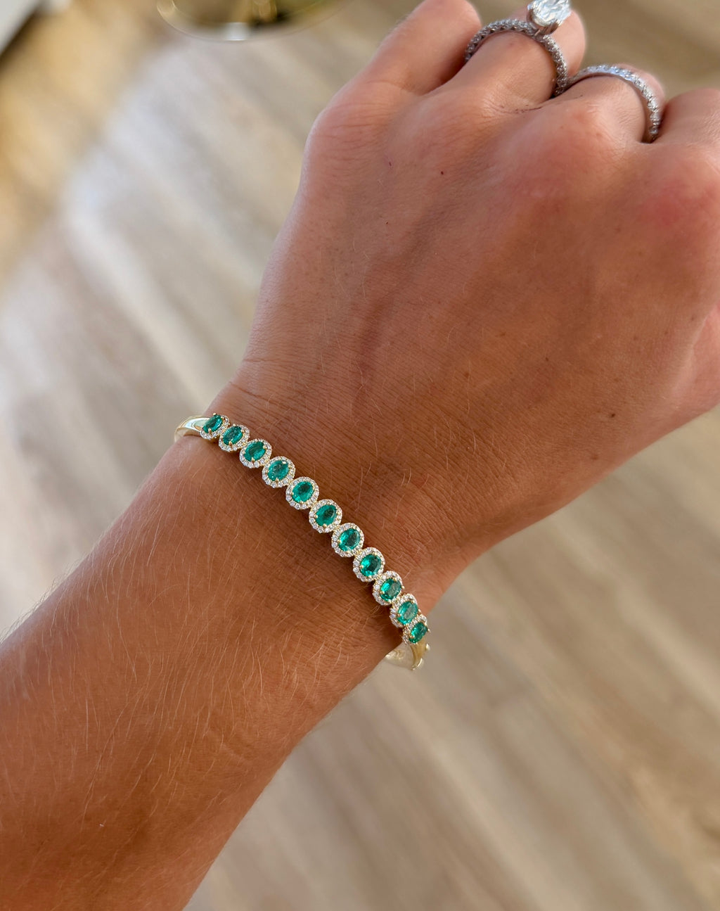Oval Emeralds & Diamond Halo Bangle