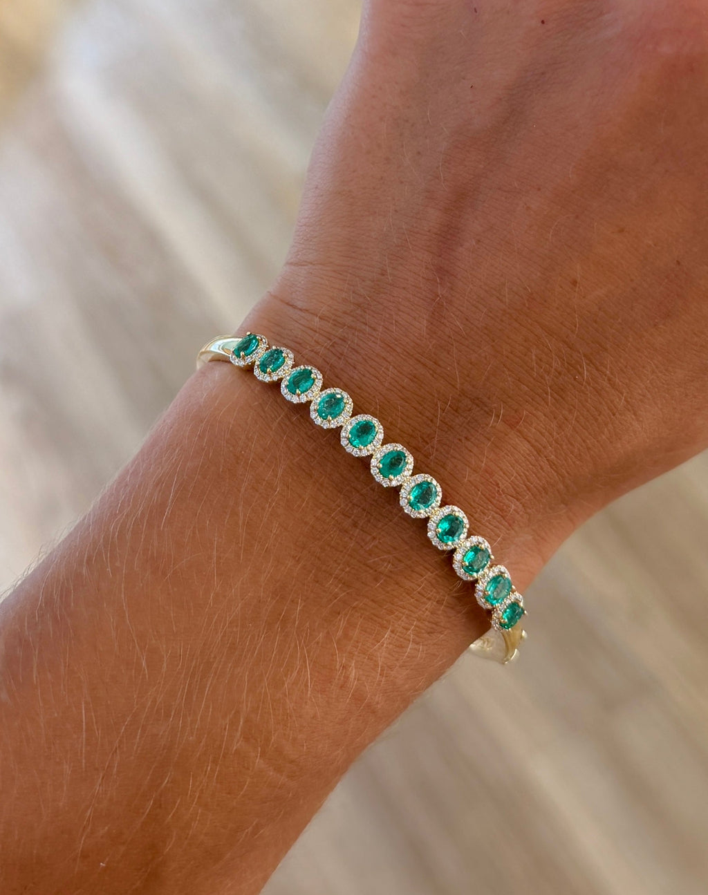 Oval Emeralds & Diamond Halo Bangle