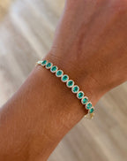 Oval Emeralds & Diamond Halo Bangle