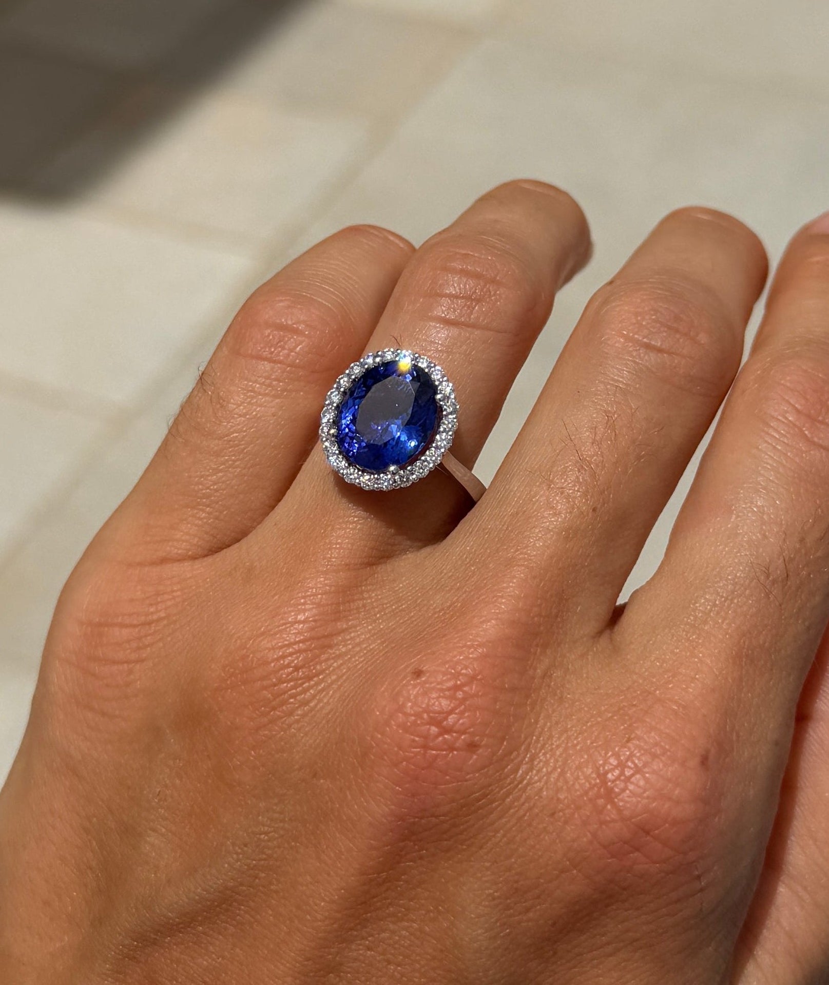 Tanzanite Oval Cocktail Ring with Diamond Halo