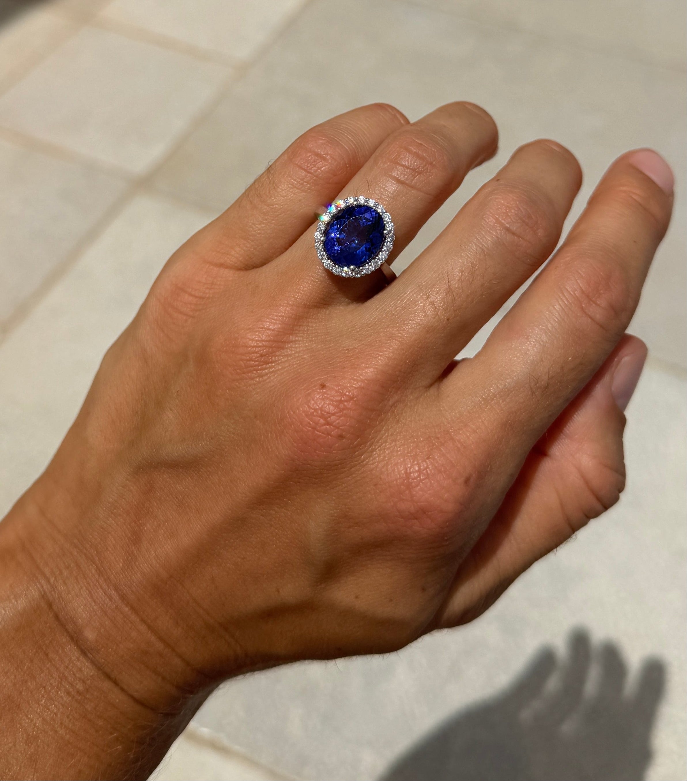 Tanzanite Oval Cocktail Ring with Diamond Halo