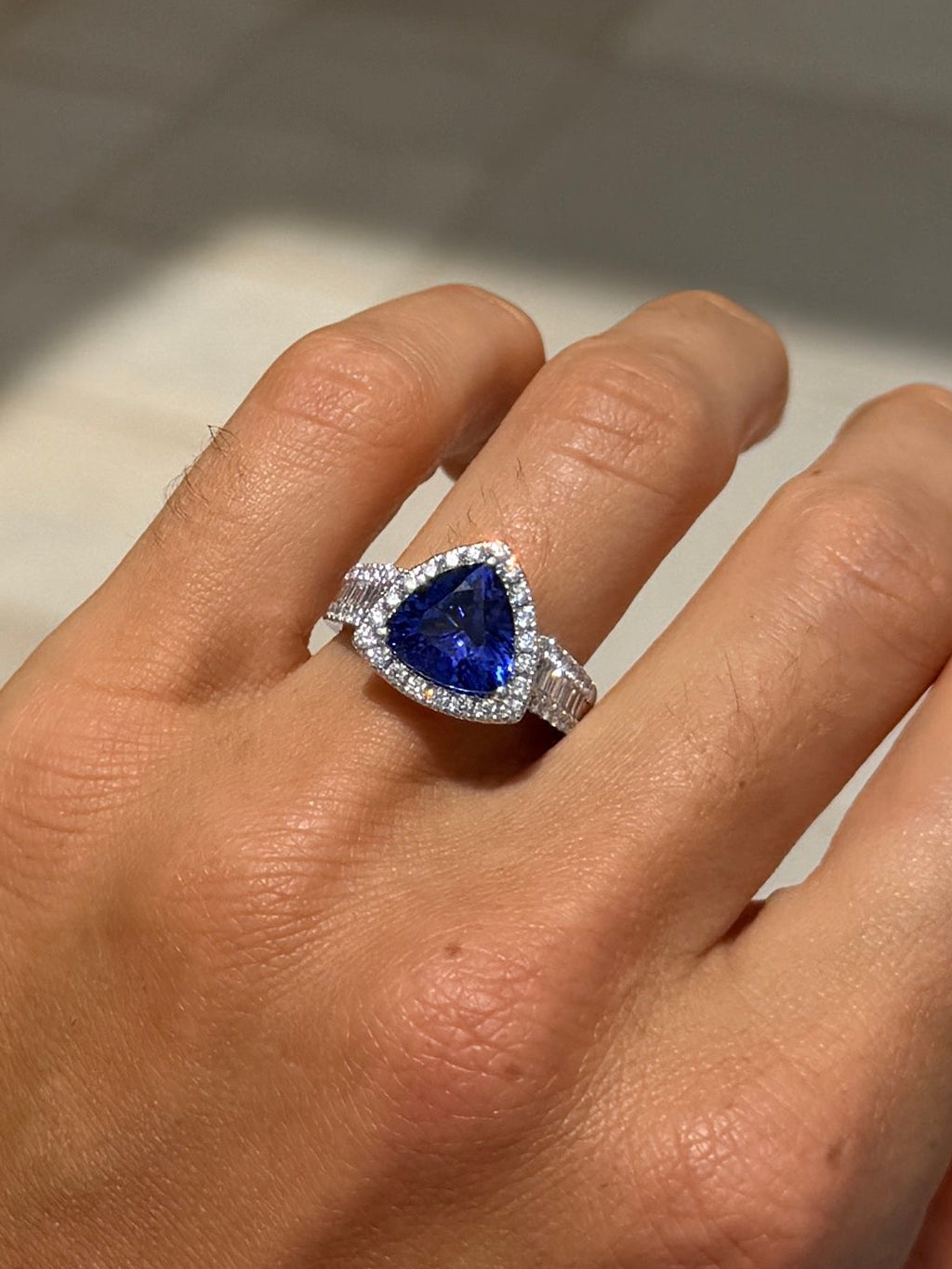 Tanzanite Trillion Cut Cocktail Ring with Diamond Halo and Band
