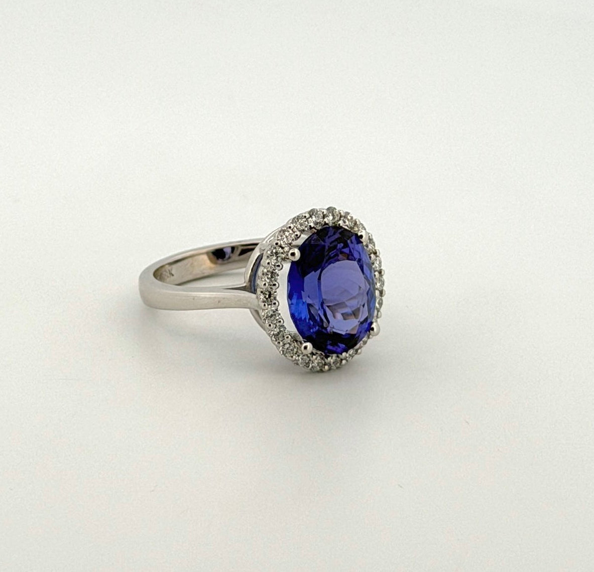 Tanzanite Oval Cocktail Ring with Diamond Halo