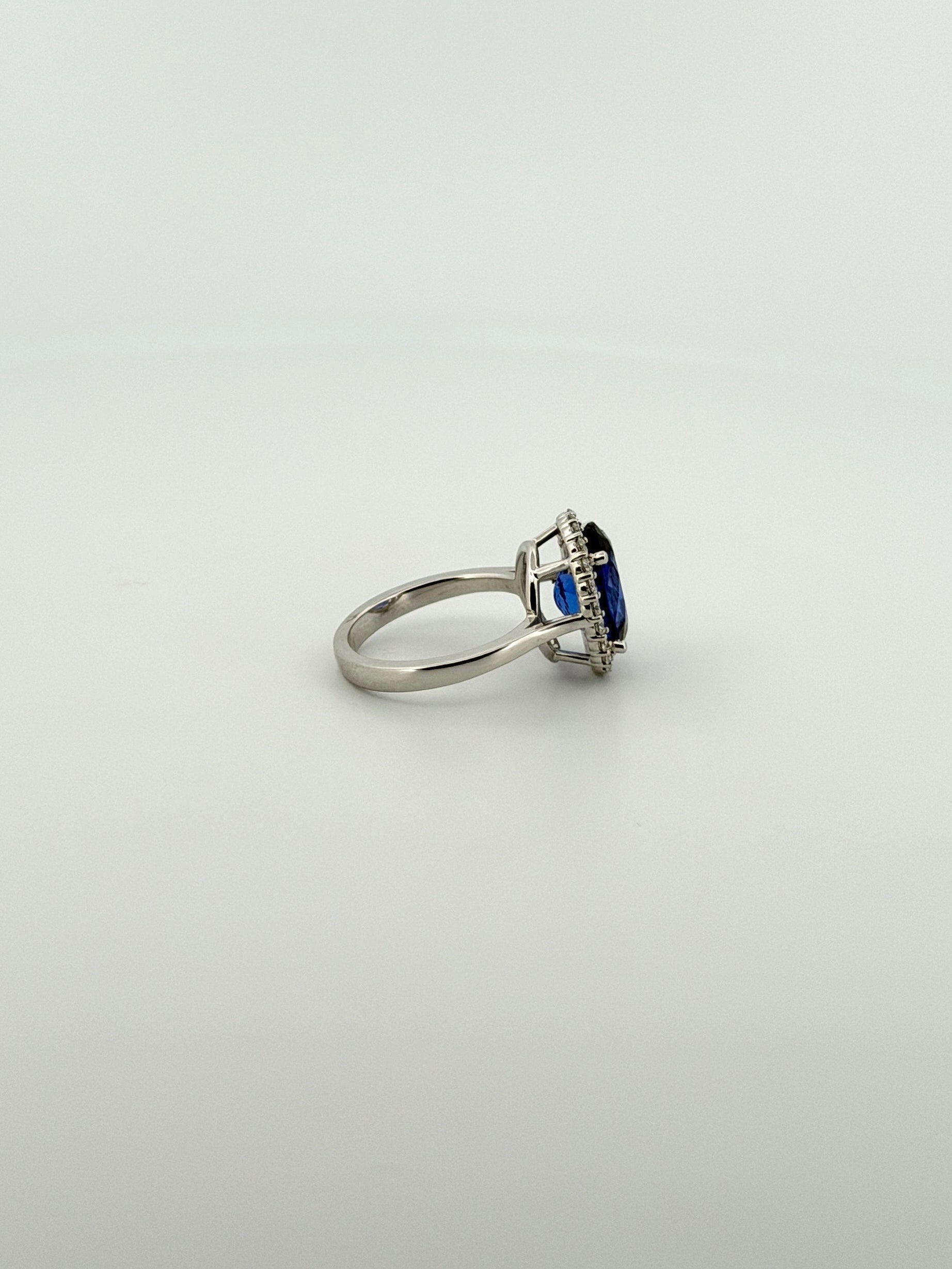 Tanzanite Oval Cocktail Ring with Diamond Halo