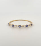 Tanzanite and Diamond Bangle in 14kt Yellow Gold
