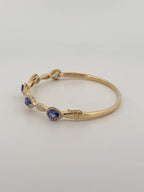 Tanzanite and Diamond Bangle in 14kt Yellow Gold
