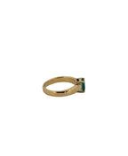 Emerald Flanked By Trillion Diamonds Ring