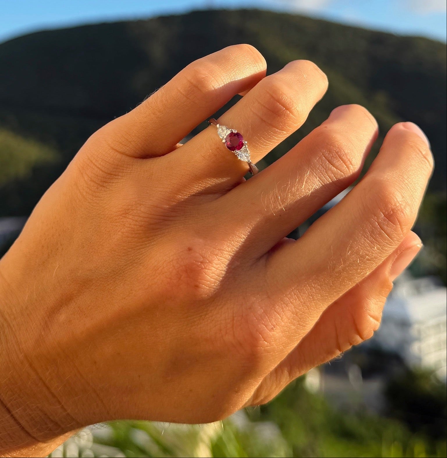 Round Ruby Ring with Pear Shaped Diamond Accents