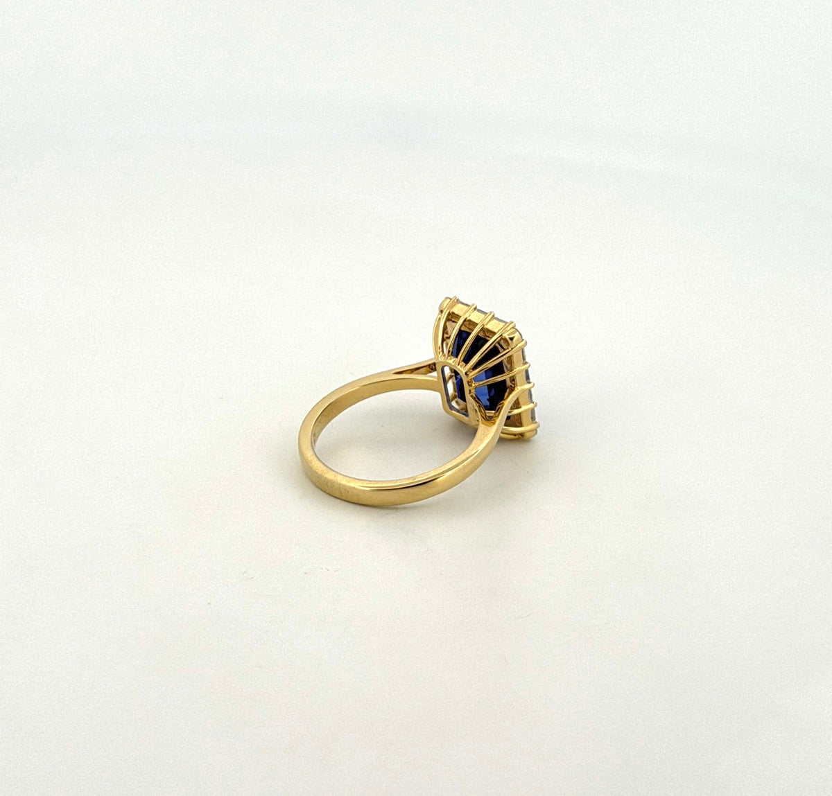 Tanzanite Ring with Baguette and Round Diamond Halo