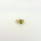 Oval Peridot and Diamond Bezel Ring