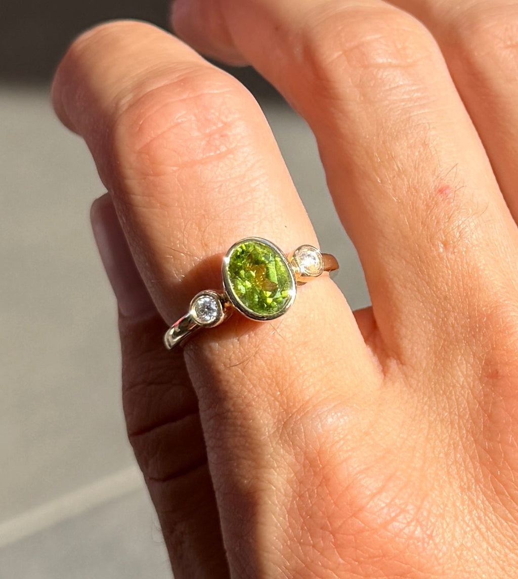 Oval Peridot and Diamond Bezel Ring