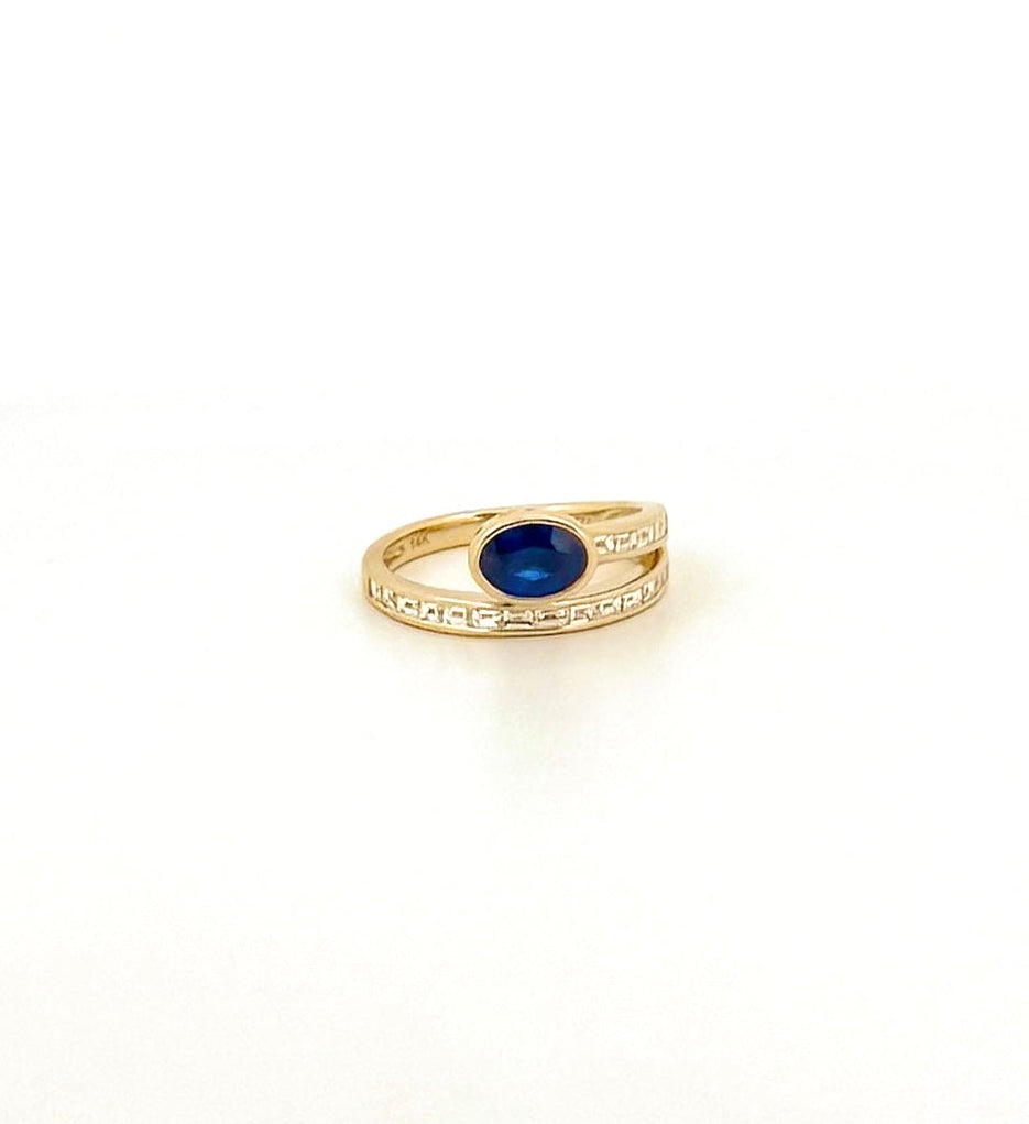 Oval Sapphire and Baguette Diamond Wrap Ring