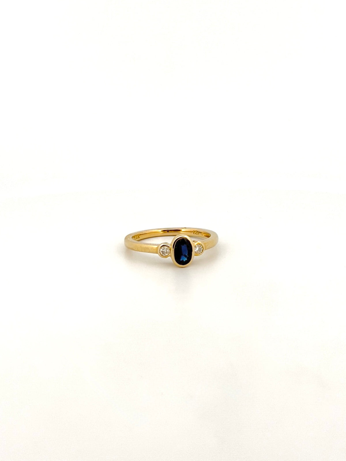 Oval Sapphire and Diamond Bezel Ring