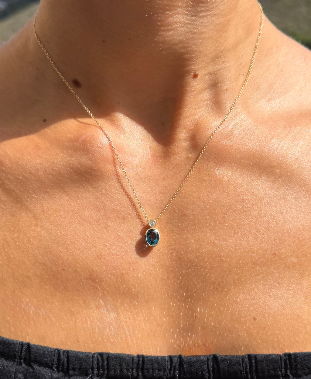 London Blue Topaz and Diamond Bezel Pendant Necklace