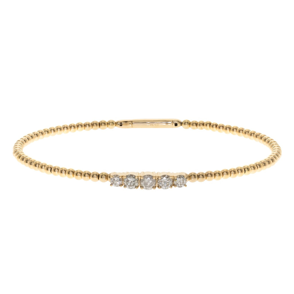 14kt yellow gold bangle with a row of 5 diamonds