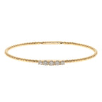 14kt yellow gold bangle with a row of 5 diamonds