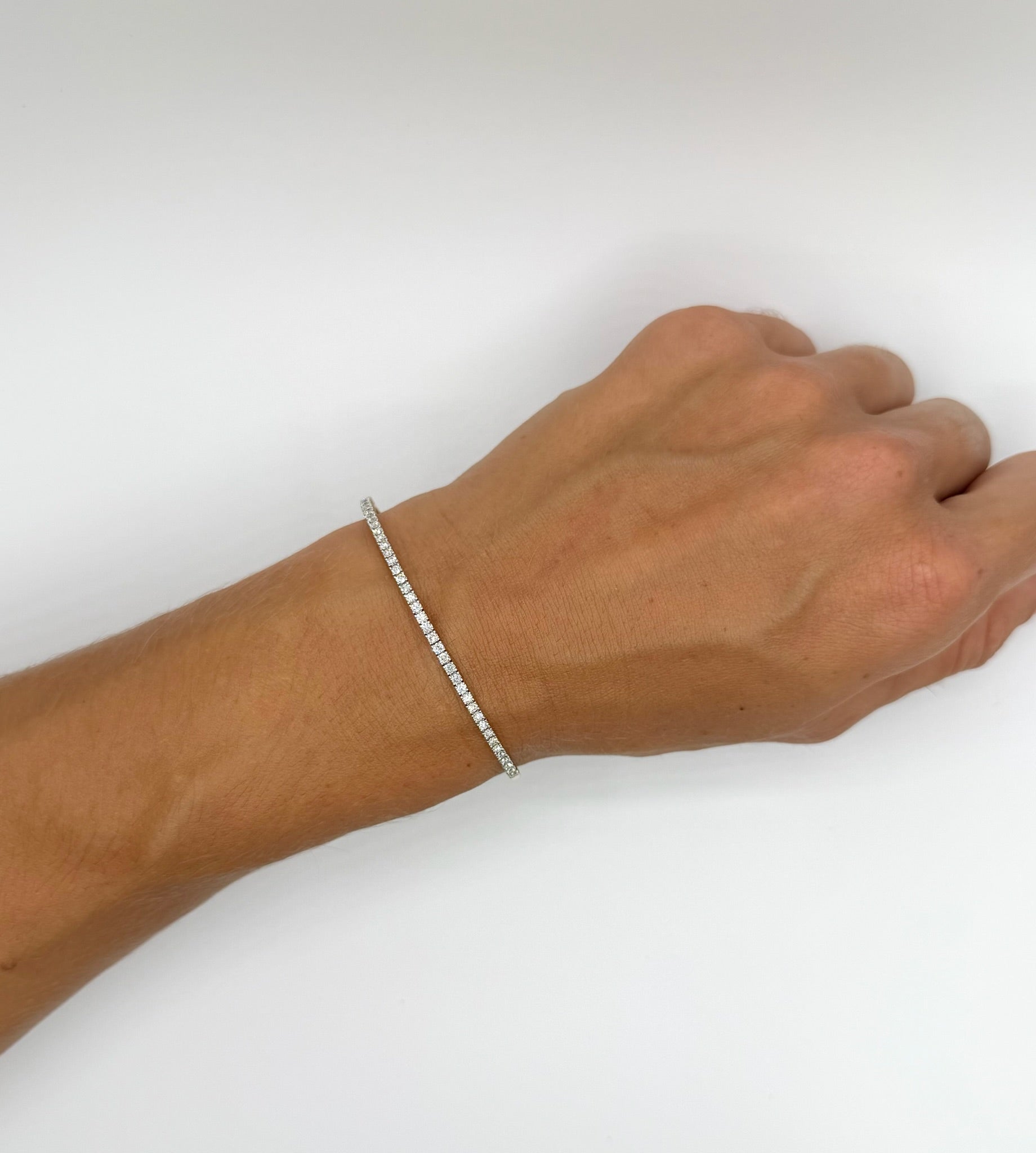 14K Yellow Gold Diamond flexi bangle modeled on woman's hand