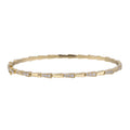 14kt yellow gold geometric bangle with natural diamonds
