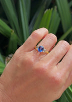 Sapphire Ring with Emerald Cut Diamond Accents