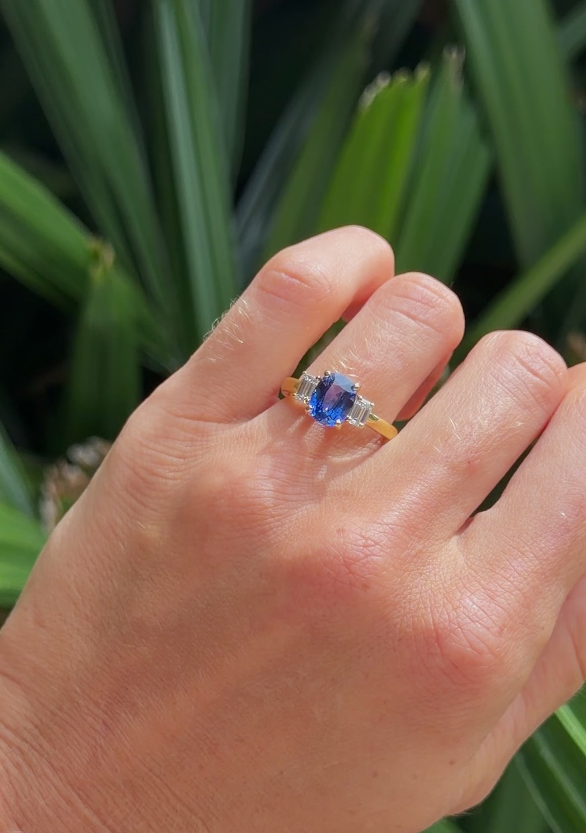 Sapphire Ring with Emerald Cut Diamond Accents